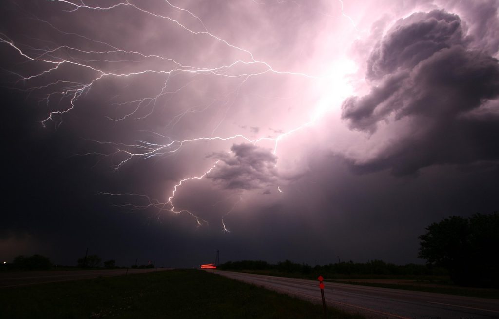 Lightning through night sky